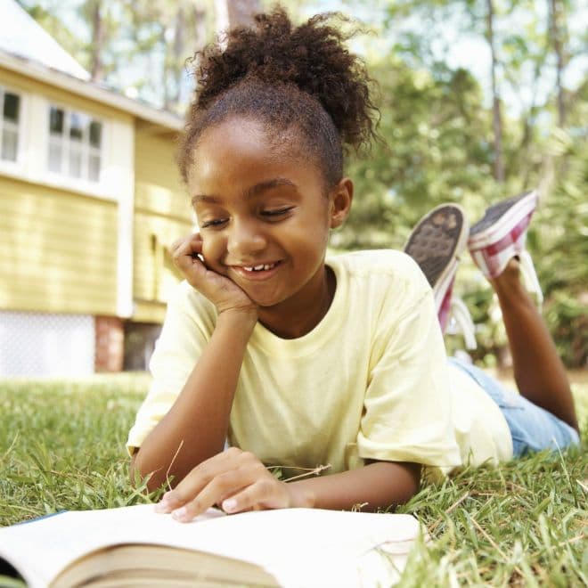 Children reading donated books